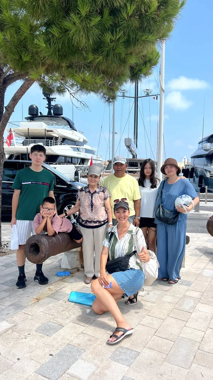 Diana Moss with a guest family in Antibes harbour
